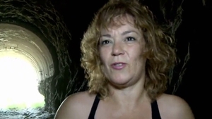 Curvy MILF fingering in public